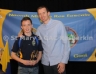 Under 14 Football Skills Winner Fearghal Kennedy receives his award from Senior Football Captain Paul Doherty